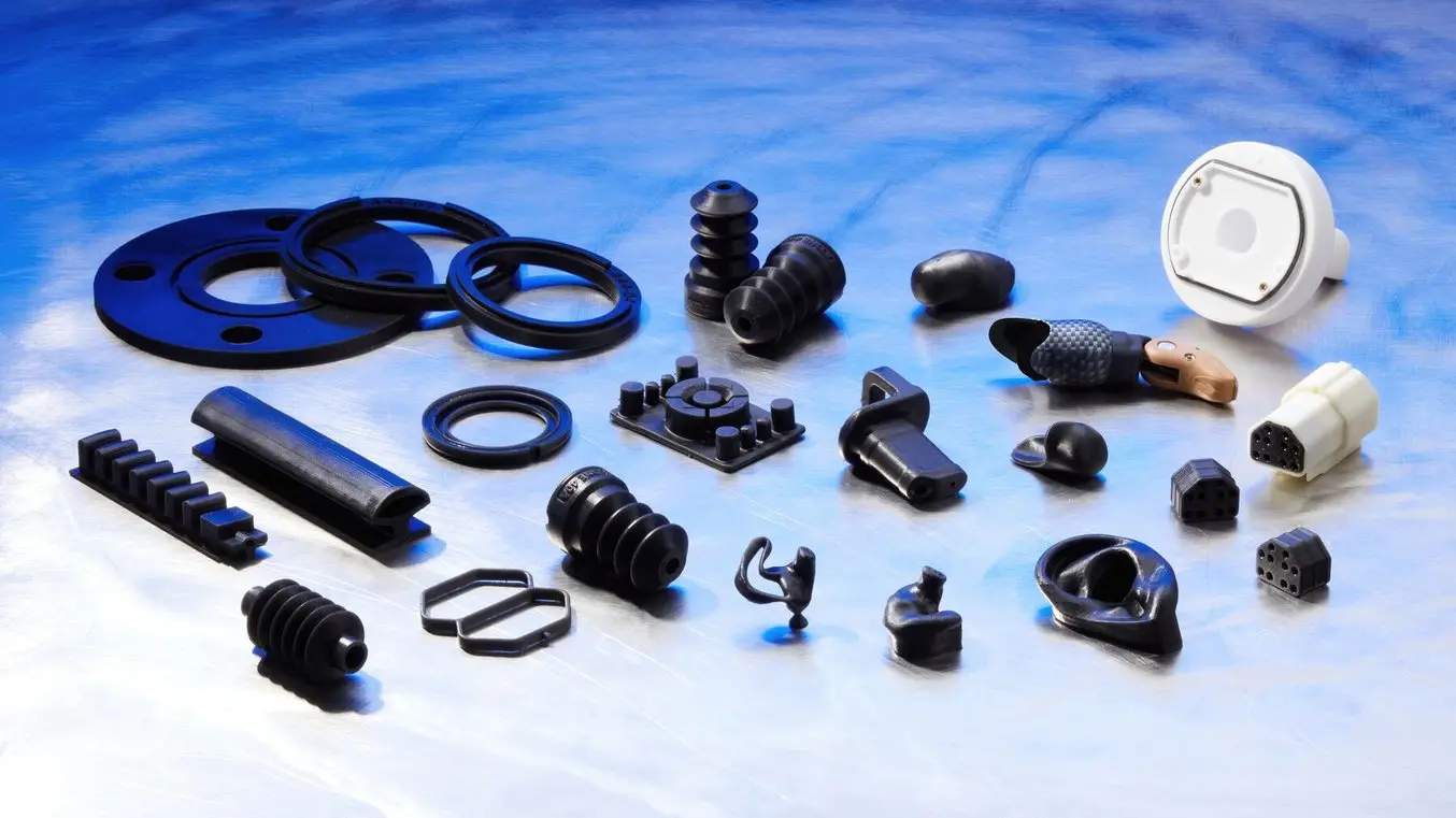 Collage of 3D-printed gaskets, O-rings, bellows, connector housings, plugs, caps, clips, and fixtures