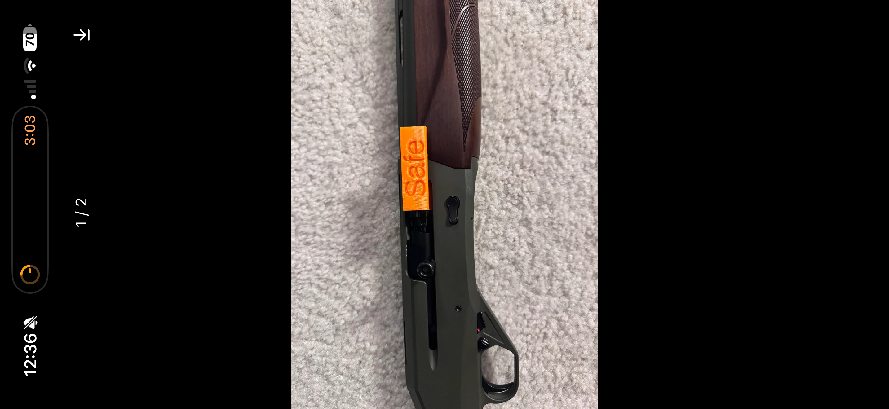 3D printed shotgun safety flag showing firearm is visibly safe when not in use