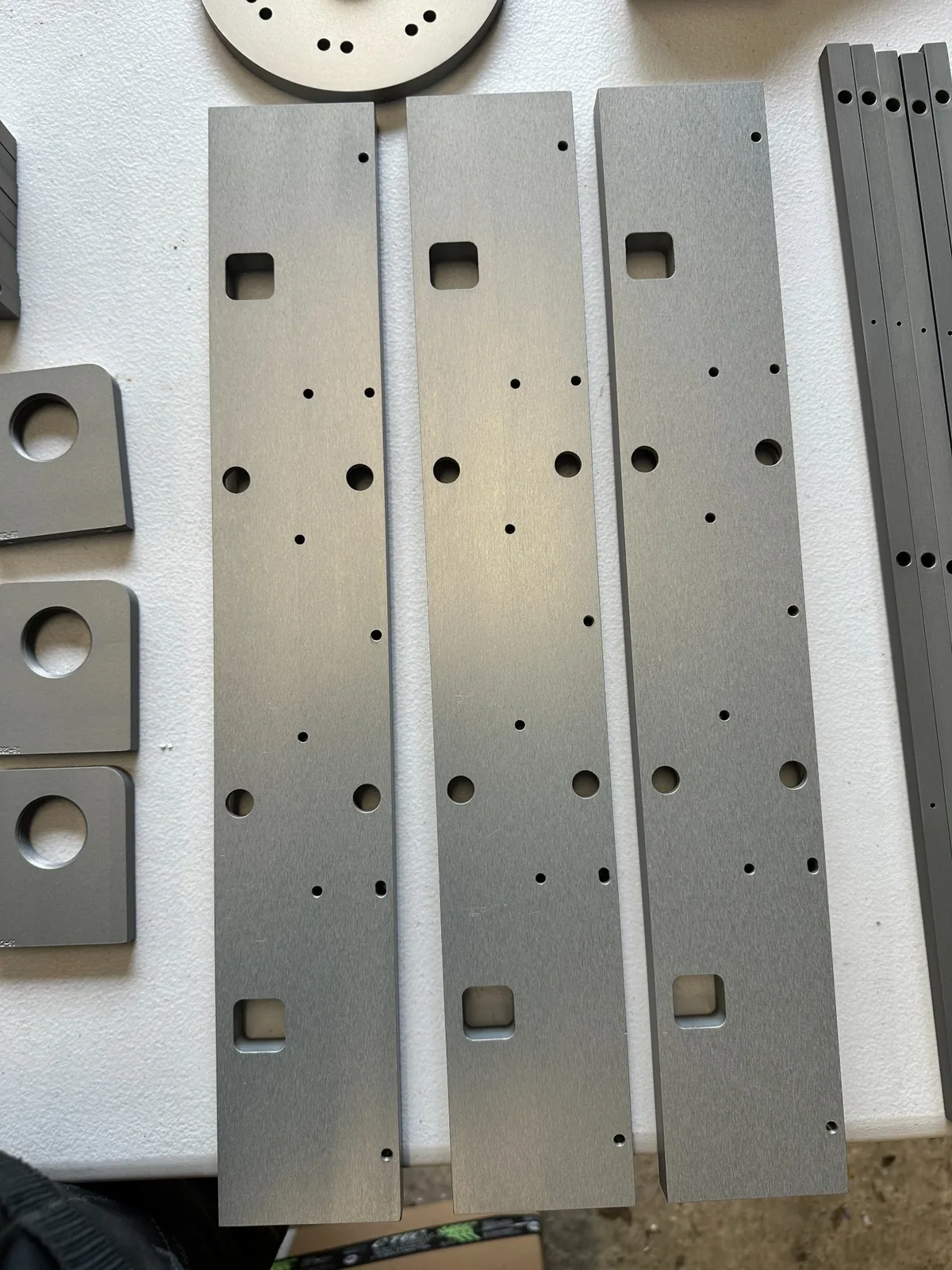 CNC cut brushed metal parts manufactured by Wards Welding and Fabrications in Milton Keynes