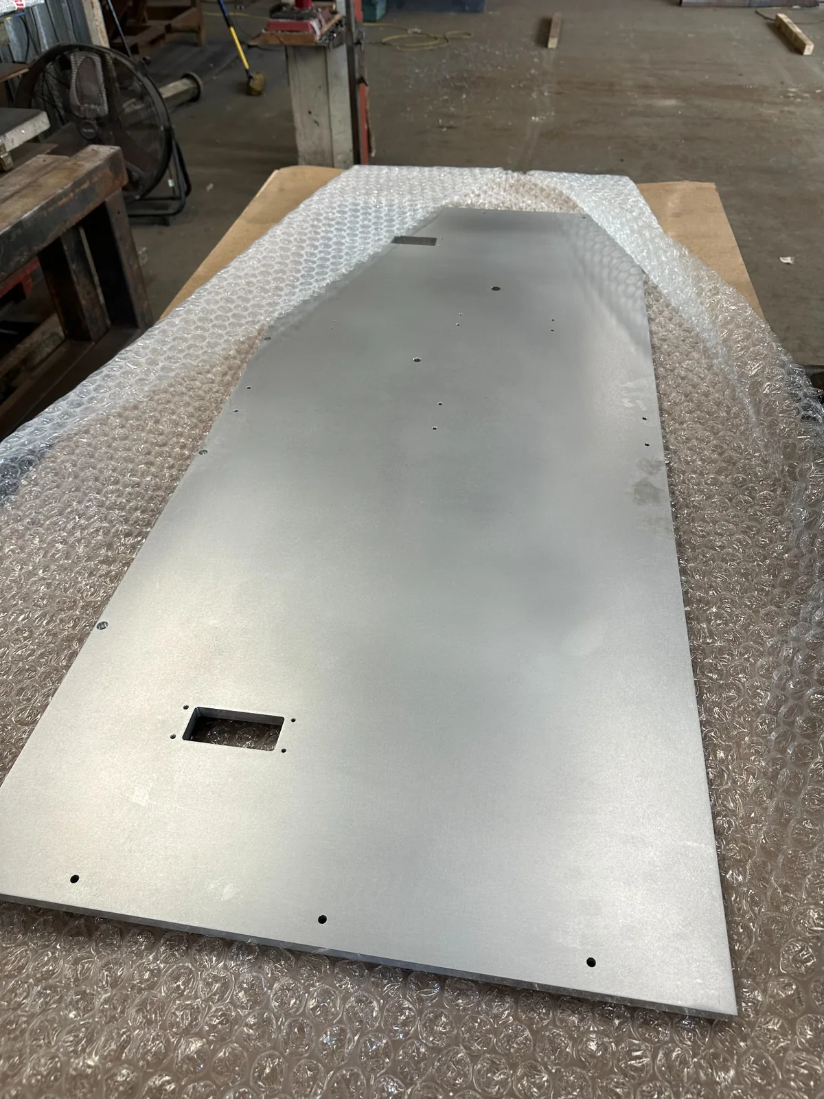 CNC cut metal panel in Wards workshop