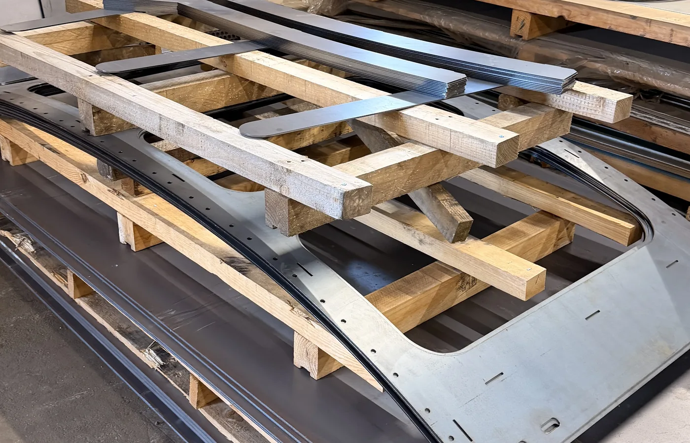 Sheet metal laser cutting parts including plates holes slots and profiles