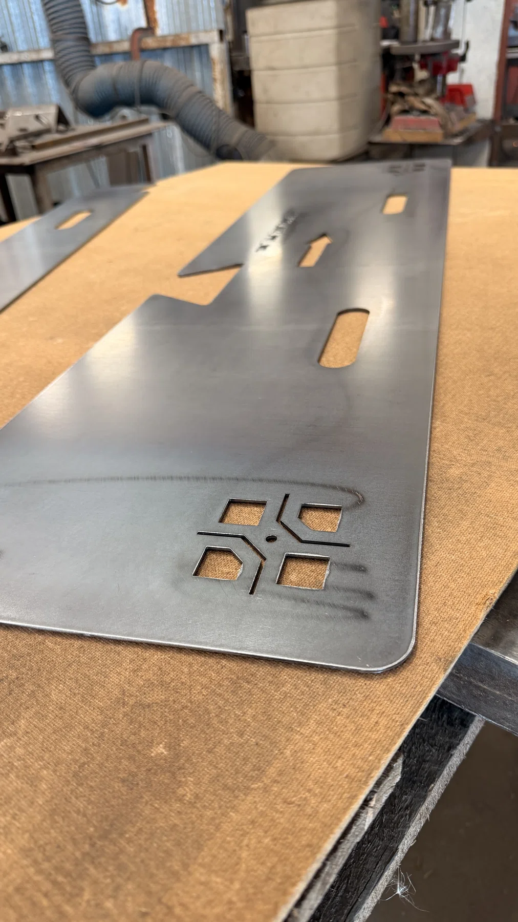 Interlocking modular warehouse floor-marking template manufactured by Wards to simplify storage and reduce shipping costs