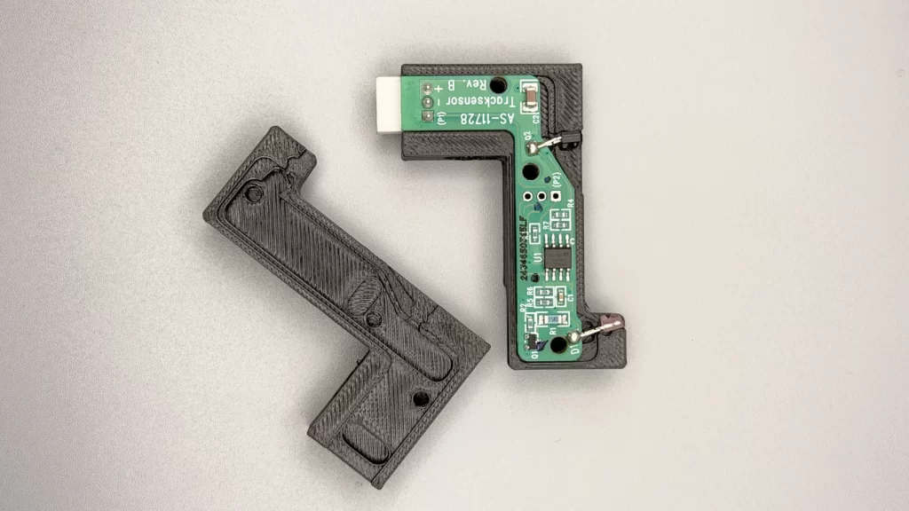 3D-printed electrical housing with its circuit board fitted